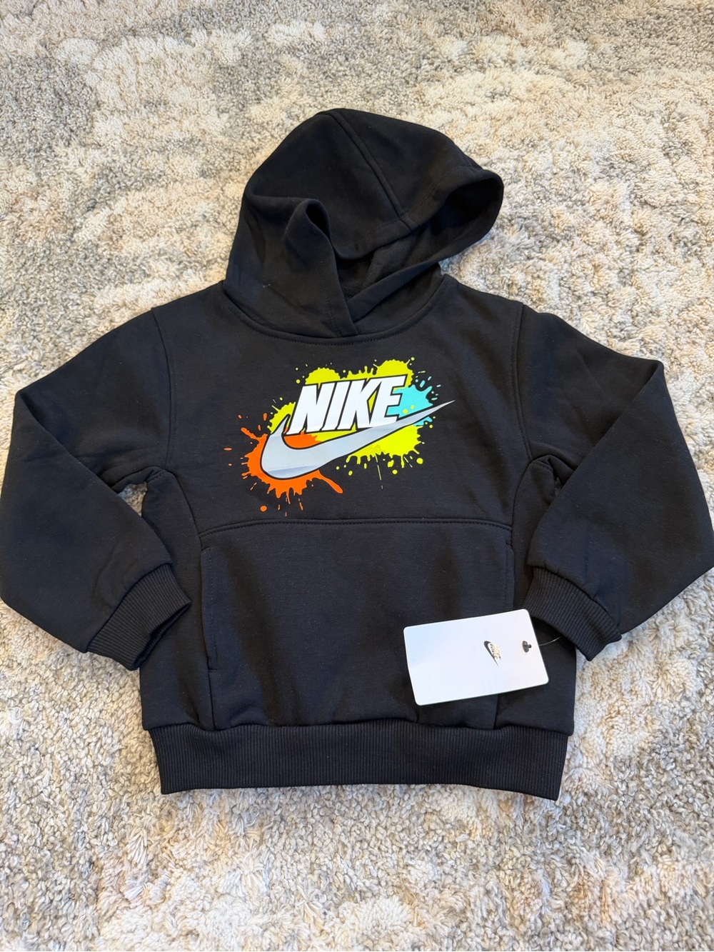 Nike Kids Black Hoodie with Neon Orange, Yellow & Blue Splash Logo